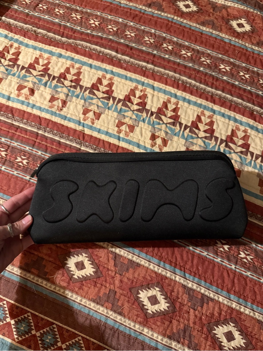 SKIMS Black Logo Pouch Bag